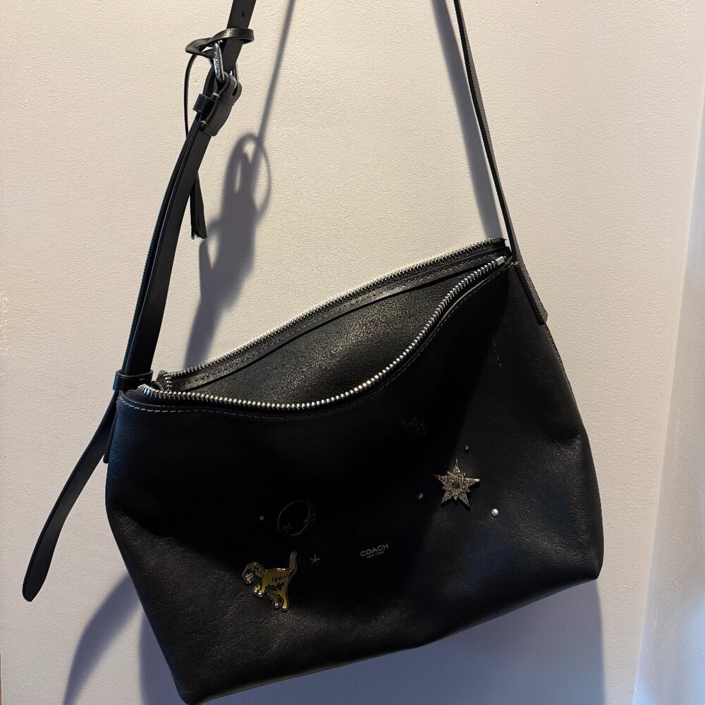 Coach black leather mott messenger 33 with rexy pin Sold out!